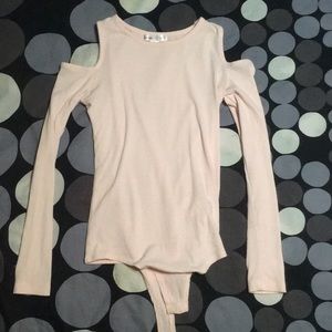 Light pink skin tight body suit